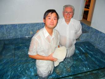 An optometry student from California studying in a university of Bayamon is  baptized by Dewayne Shappley in Bayamón, Puerto Rico. 