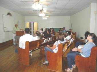 Bayamón, Puerto Rico church. Bro. Alfonso Estrella teaches the Young Adult Class in a large room on the second floor. 