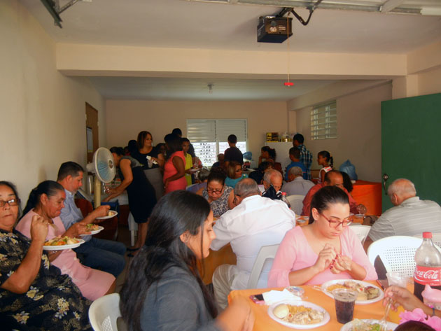 The Gurabo, Puerto Rico Church of Christ enjoys a fellowship lunch after the morning worship service and a ceremony to name three elders and two deacons.