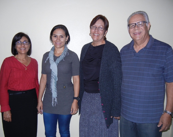 A young woman is baptized in the church of Christ in Rio Piedras, Puerto Rico after studying materials on editoriallapaz.org.