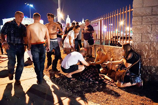 A picture of the dying, wounded and living after the shooting at the Country Music Festival in Las Vegas, Nevada, October 1, 2017, illustrates the subject Innocent people died in Las Vegas! 