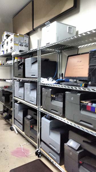 Full color printers used to produce tracts in Spanish and English for churches of Christ.