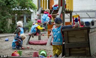 Equality for all: Children at the Egalia preschool, in the Sodermalm district of Stockholm, play with neutral toys as part of the school's 'genderless' agenda